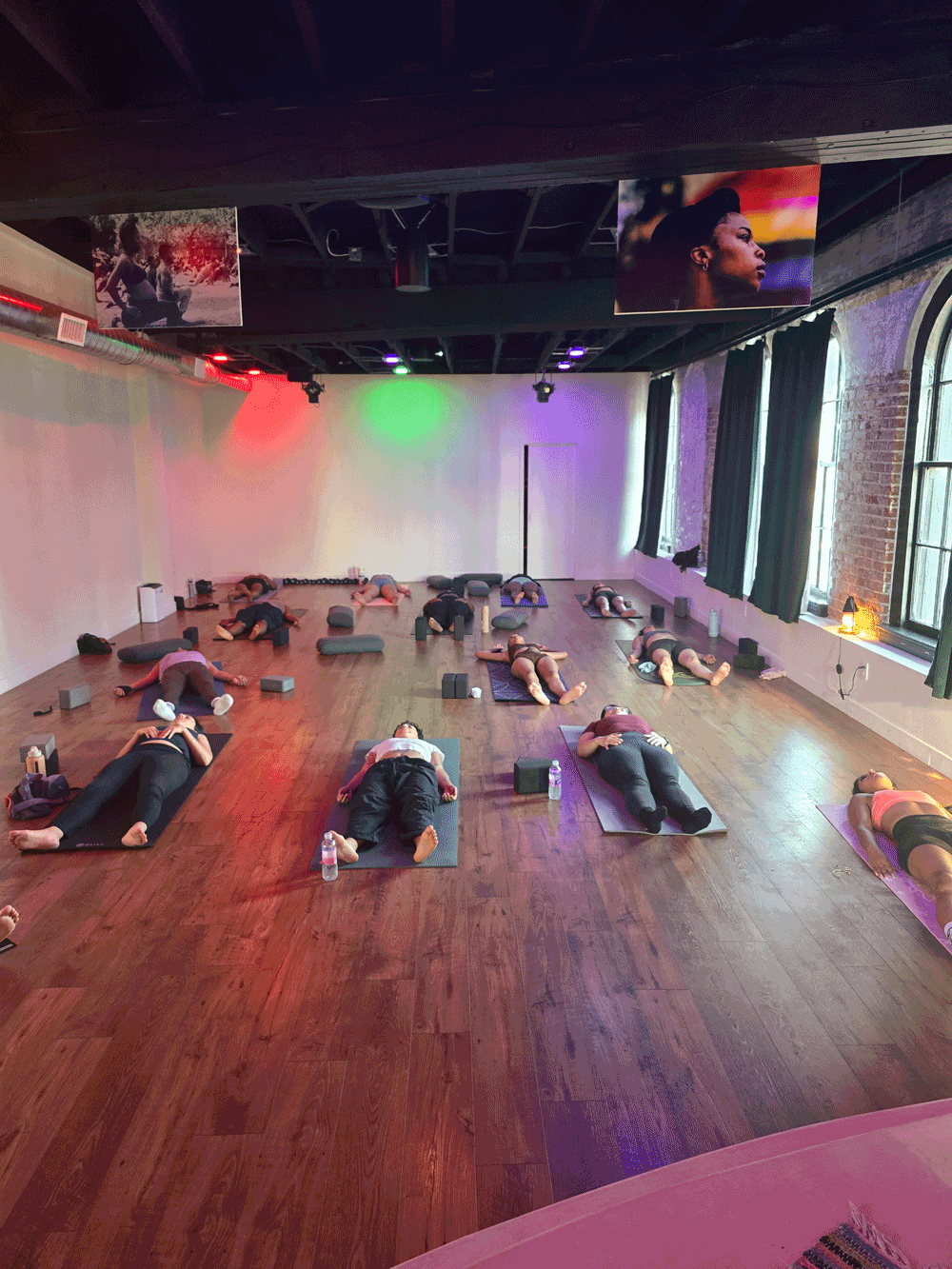 Yoga class practicing at WalkGood Yard
